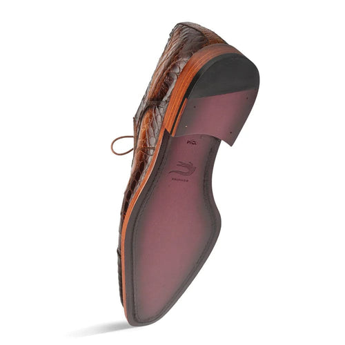 Giovanе Camel derby: genuine brown crocodile upper with contrasting smooth cap toe. Low-profile, lace-up, rounded toe. Polished dark brown leather sole with logo. Crafted for distinct style.