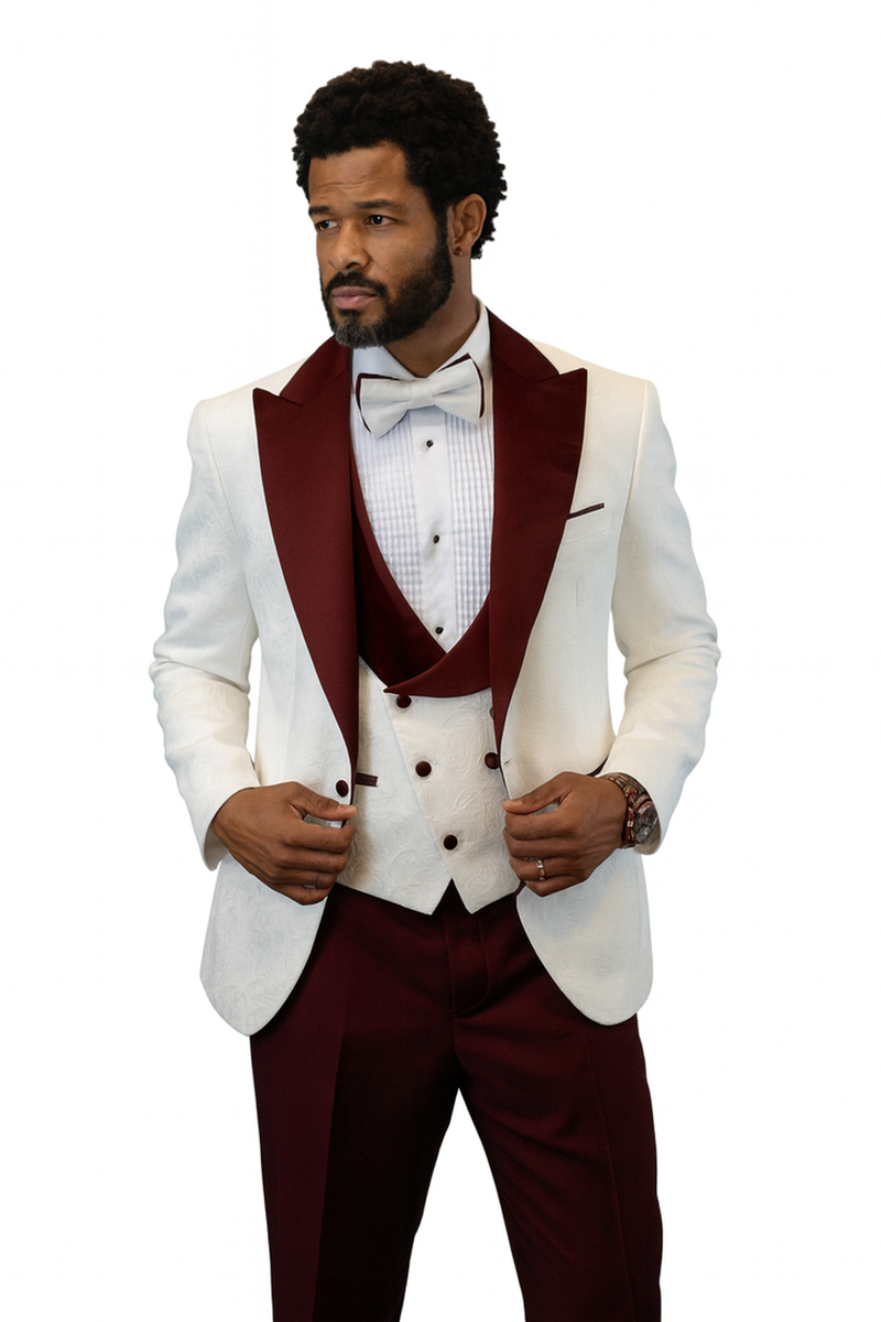 Hilton tuxedo: white & burgundy paisley peak lapel jacket, matching burgundy shawl vest with lace-like pattern, and solid burgundy wool pants. Features a white bow tie.