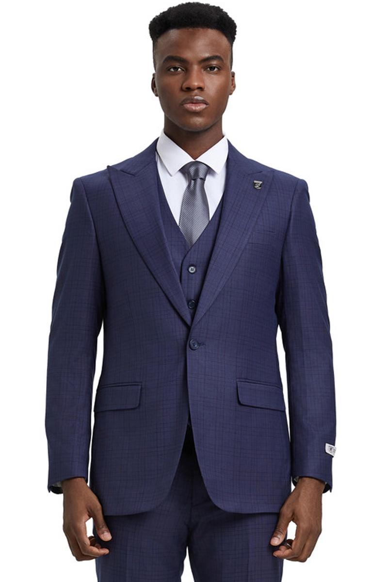 Stacy Adams men's suit in eggplant purple windowpane plaid. Features a fitted silhouette, one-button closure, wide peak lapels, and a matching vest. Trousers complete the set.