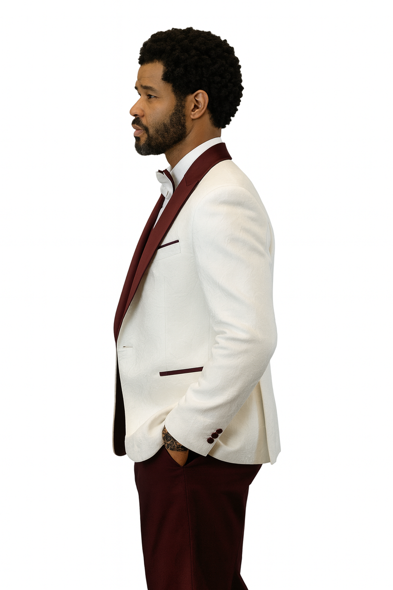 White tuxedo jacket with burgundy lapel & shawl vest. Matching burgundy wool pants. Paisley pattern on white fabric, subtle burgundy details. Includes bow tie, structured, fitted, single-breasted.
