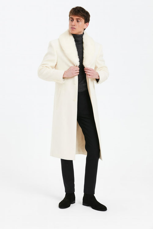 Ivory men's full-length overcoat with faux fur shawl collar. Off-white color, straight silhouette, button closure. Luxurious and stylish.