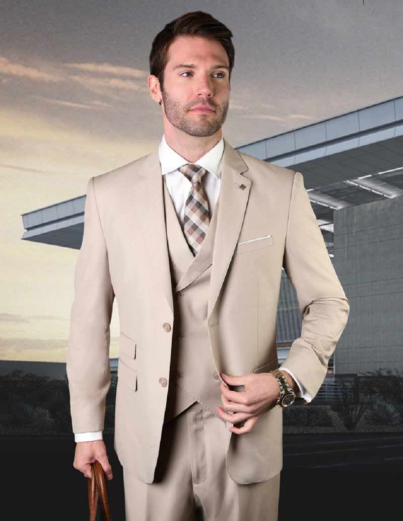Tan wool slim-fit men's suit with a double-breasted vest. Features a tailored fit, structured shoulders, and notched lapels. Single-breasted jacket and matching vest. Smooth, patternless fabric emphasizes sharp lines and a formal silhouette.