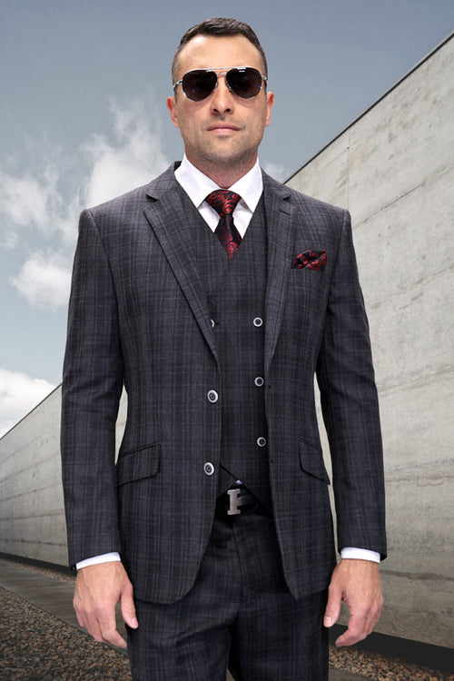 Men's charcoal grey wool suit with a modern fit, plaid windowpane pattern. Includes a fitted blazer, matching vest, and tailored trousers. Features notched lapel, multiple buttons, front pockets, and a contrasting pocket square for a contemporary look.