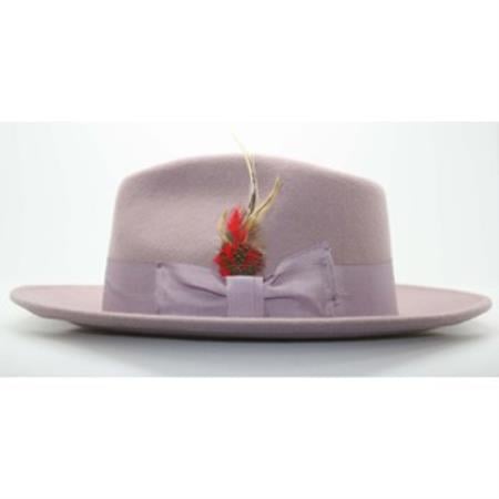 Lavender fedora with a structured, wide brim. Crafted from soft felt, it boasts a flat crown, bow band, feather detail, and floral accent.