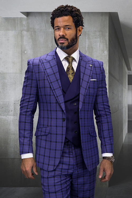 Sapphire blue wool suit with windowpane plaid. Single-button jacket, double-breasted vest, tailored fit. Notch lapel, two front pockets. Textured appearance.