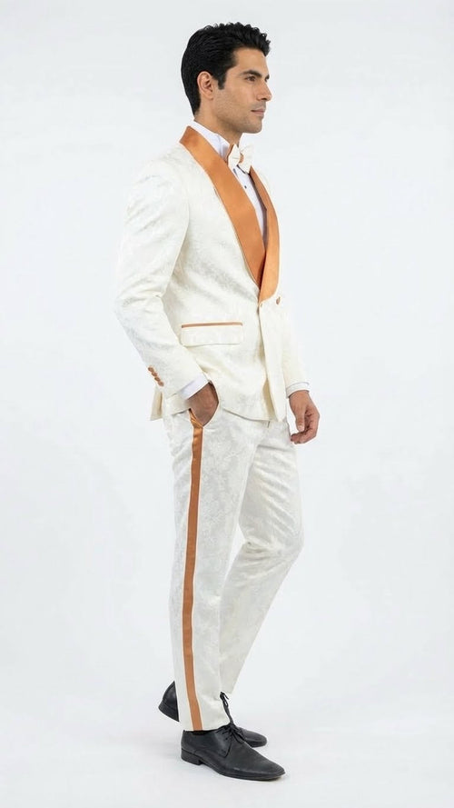 Men's ivory tuxedo with gold jacquard pattern. Fitted single-breasted jacket with gold satin lapels. Ivory trousers feature a gold side stripe, creating a cohesive, elegant look.
