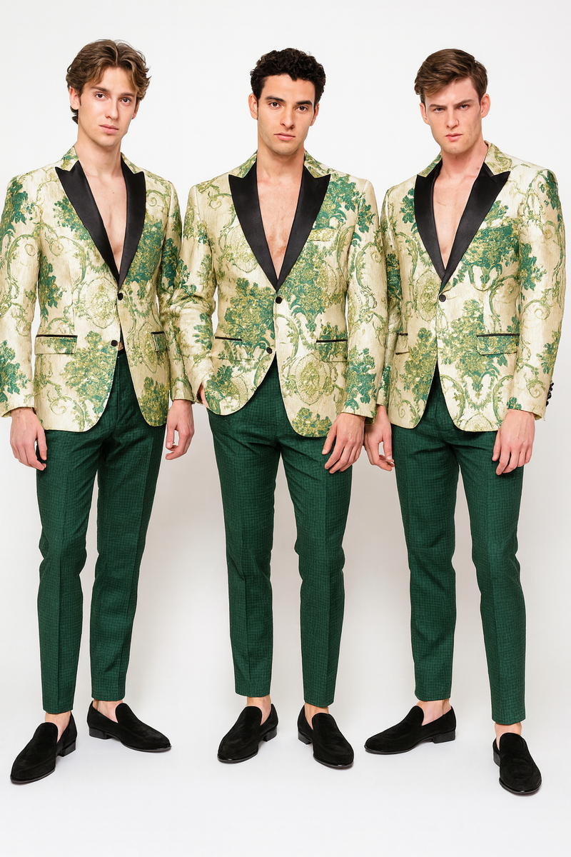 Men's ivory tuxedo jacket with green floral embroidery, black satin lapel. Paired with hunter green pants for a coordinated, detailed outfit.