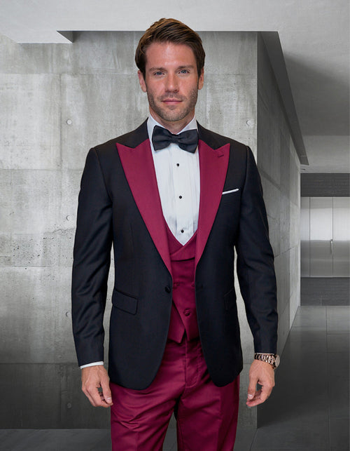 Men's wool tuxedo: Black jacket with burgundy peak lapels, burgundy vest & pants. Fitted shape. Includes white shirt, black bow tie. Perfect for weddings.