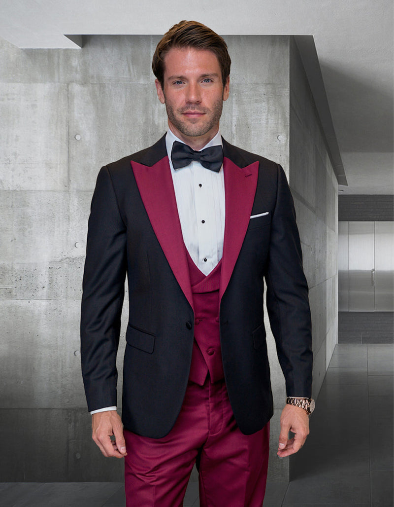 Men's wool tuxedo: Black jacket with burgundy peak lapels, burgundy vest & pants. Fitted shape. Includes white shirt, black bow tie. Perfect for weddings.
