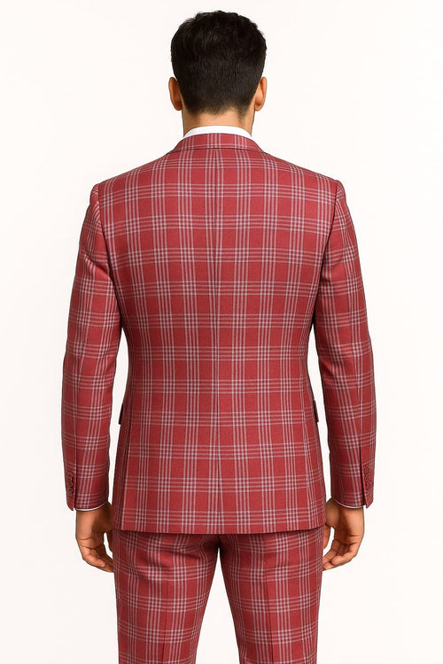 Men's red plaid three-piece suit. Bold checkered pattern with vest & matching pants. Tailored fit, structured shape, and a vibrant red hue with lighter lines in the plaid, suggesting a formal fabric.