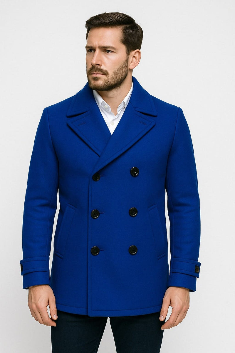 Royal blue men's double-breasted wool peacoat. Structured, tailored fit with notched collar, six black buttons, and side pockets. Features cuff detailing and a smooth wool texture.