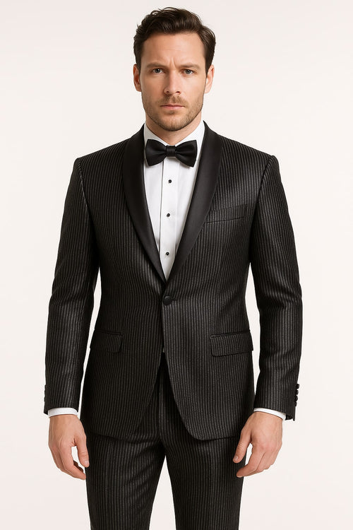 Men's black tuxedo with shiny, glossy material. Features satin shawl lapel, vertical pinstripes, button closure, and pockets. Includes matching trousers.