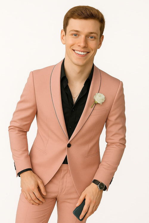 Men's slim fit pink tuxedo with black trim. Tailored design, pink satin finish, contrasting black lapels, and fitted silhouette. Includes matching pink trousers.