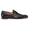 Mezlan Lisbon loafer: Black ostrich leather slip-on with a sleek, elongated shape and slightly pointed toe. Features textured quill bumps, low heel, smooth lining, and flat sole. Simple and refined design.