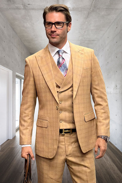 Men's designer wool suit. Double-breasted camel windowpane plaid vest, tailored fit. Structured shoulders, two-button closure. Light tan with darker plaid lines. Matching trousers.