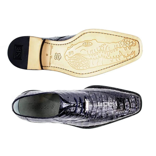 Exotic Belvedere Chapo oxfords crafted from glossy crocodile hornback leather. Features pointed toe, sleek profile, and a deep, dark color. Leather insole with branding, crocodile graphic outsole, and decorative metal detailing.