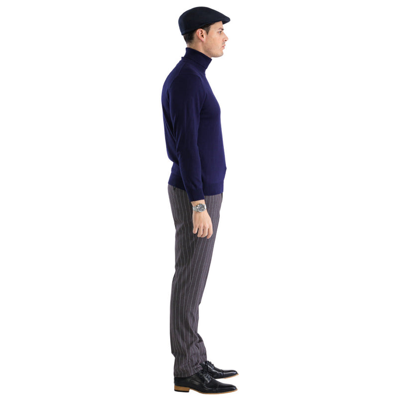 Navy men's fitted turtleneck sweater. Features a snug, high collar and long sleeves. Made from smooth, stretchy fabric in a solid navy color. Simple, classic silhouette.