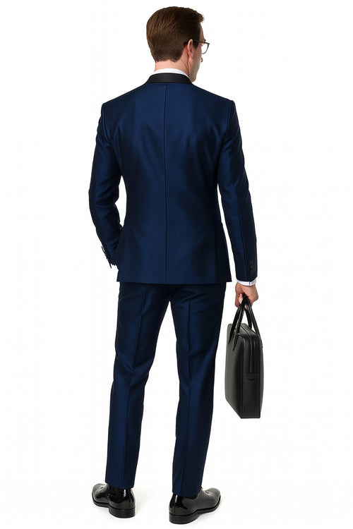 Navy satin tuxedo for men with black shawl lapel. Three-piece design with structured form and tailored trousers.