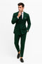 Green pinstripe double-breasted suit for men, tailored fit. Structured jacket with wide lapels & 6 buttons. Slim, tapered trousers. Smooth, sturdy fabric with vertical stripes. Paired with white shirt and dark tie.