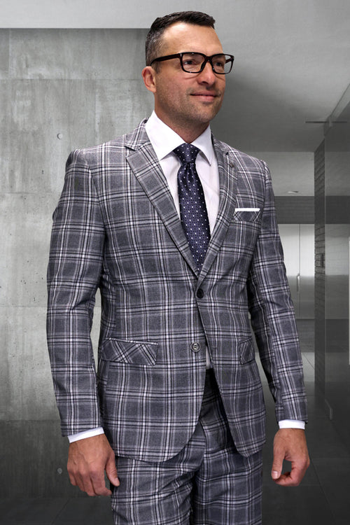 Men's modern fit Italian wool suit in taupe plaid. Features a structured jacket with notched lapel & front pockets, plus matching trousers. Gray and taupe plaid pattern.