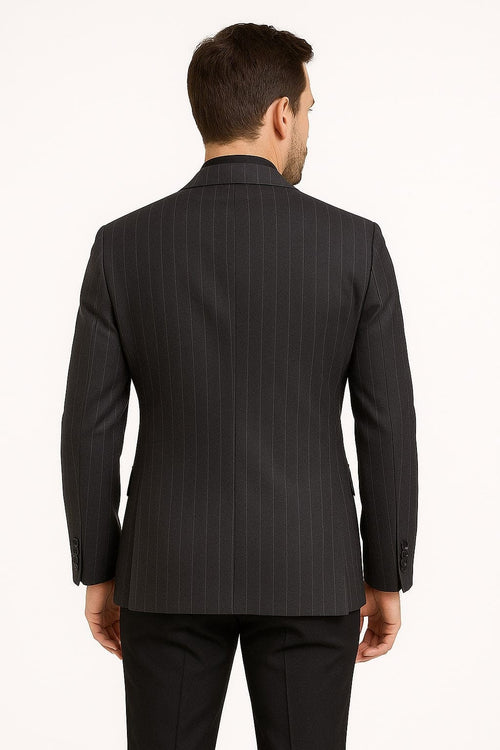 Black pinstripe blazer with a dark charcoal grey pattern. Fitted silhouette, tailored shoulders, single back vent. Long sleeves with buttoned cuffs. Smooth, formal fabric and vertical pinstripes.