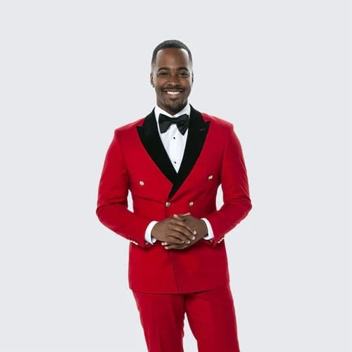 Red double-breasted suit with black velvet lapel and matching trousers. Includes a black bow tie. Classic and stylish.