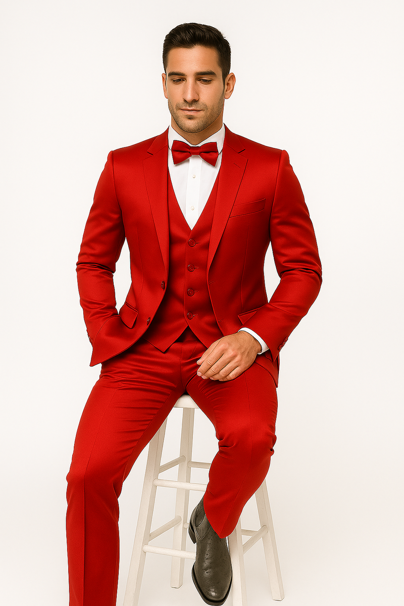 Alberto Nardoni's Red Majesty tuxedo: vibrant red, fitted jacket (single-button), matching vest (three buttons). Includes tailored pants and a red bow tie for a formal, polished look made from smooth fabric.