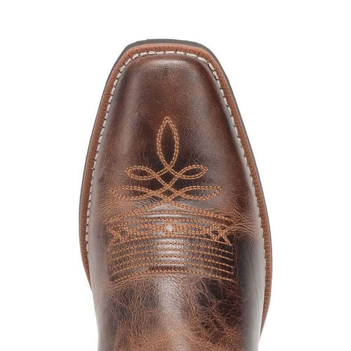Laredo Breakout rust brown leather western boots for men. Pointed toe, decorative stitching, and textured leather upper. Smooth finish with light brown edge stitching.