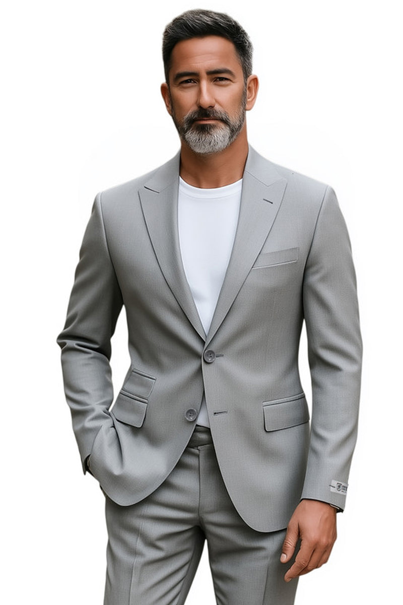 Light grey Stacy Adams slim fit men's suit, perfect for weddings or business. Features a tailored jacket with a two-button closure, notched lapel, and front pockets. Straight-leg pants complete the uniform, pattern-free look. Lightweight fabric.