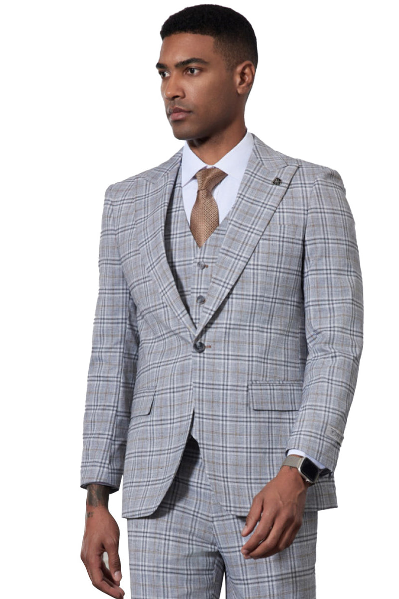 Men's Stacy Adams blue glen plaid suit. One-button closure, peak lapels, and a matching vest create a structured, tailored look. Features a glen plaid pattern, two front pockets, and smooth fabric.