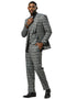 Grey glen plaid Stacy Adams suit. One-button jacket with peak lapels, structured shoulders, and matching vest. Straight-cut trousers complete the fitted silhouette.
