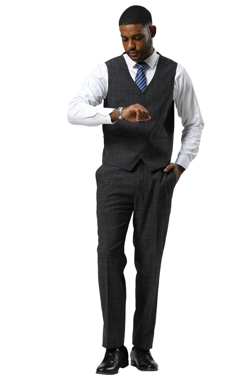 Men's charcoal sharkskin suit by Stacy Adams. One-button peak lapel, fitted design. Includes vest. Straight-leg pants. Complete with white shirt & blue striped tie.