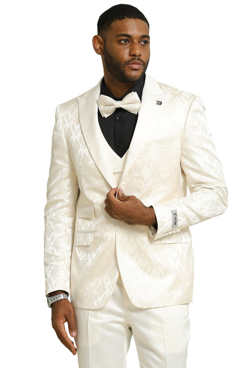 Ivory men's tuxedo with shiny brocade. Includes double-breasted vest, black formal shirt. Jacket: notched lapel, pockets. Pants: solid ivory, tailored fit.