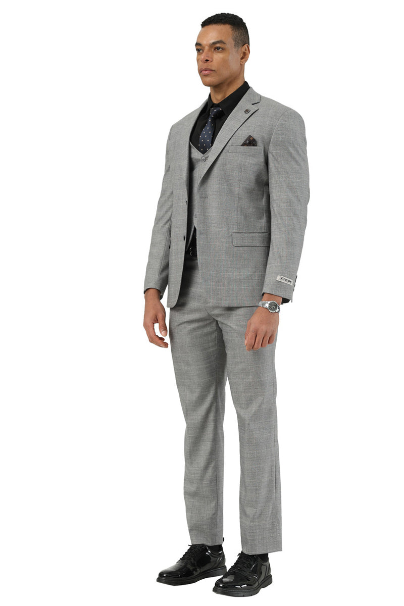 Men's Stacy Adams light grey glen plaid summer suit. Features a fitted, two-button jacket, matching vest, and tailored trousers. Complemented by a dark shirt and tie.