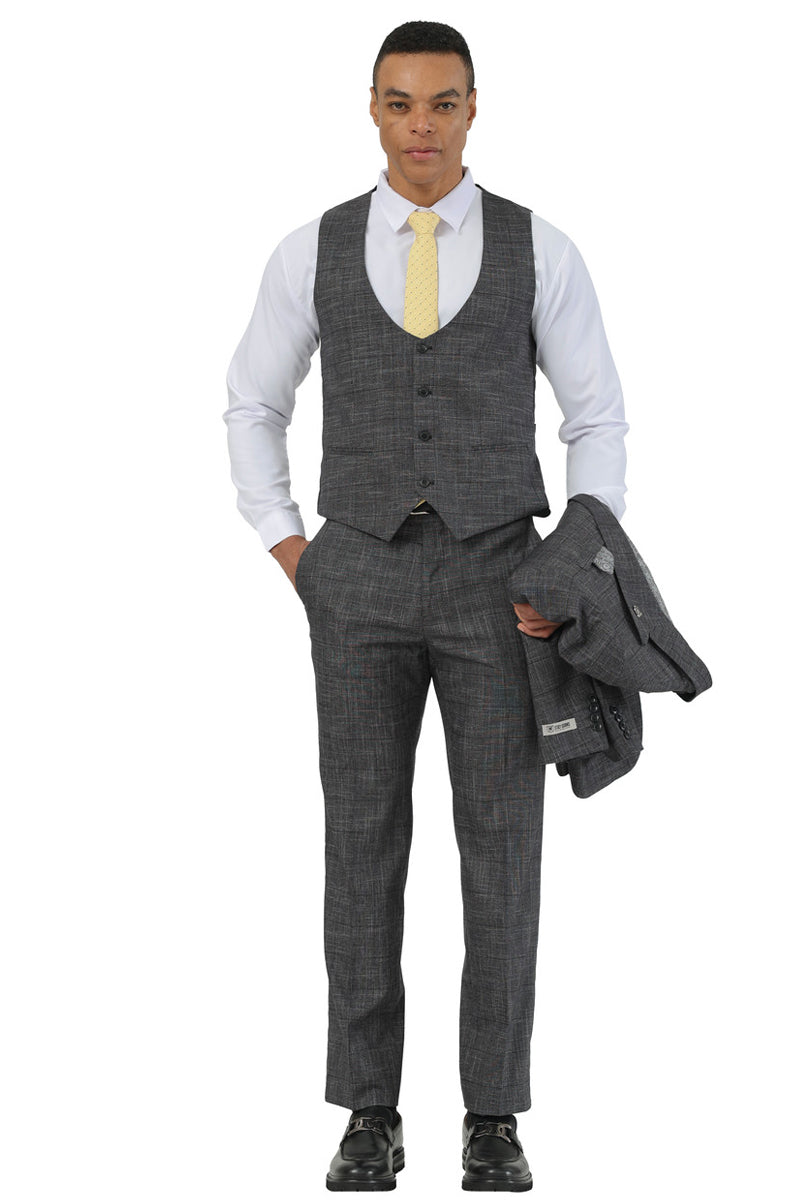 Black sharkskin windowpane Stacy Adams suit with a fitted vest and straight-fit trousers. Features a low-neckline vest and subtle check pattern. Accessorized with a light yellow tie and includes a matching coat.