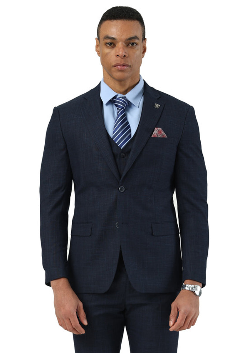 Navy sharkskin Stacy Adams suit: fitted blazer with notch lapels, single-button closure, and matching trousers. Includes a vest, all in navy. Tailored silhouette.
