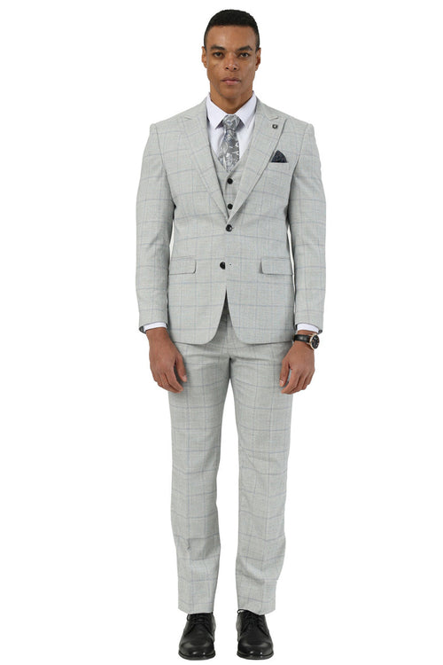 Light grey men's suit with windowpane plaid. Two-button, vested design with peak lapel. Subtle grey plaid pattern. Fitted jacket and matching trousers.