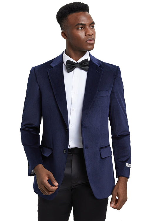 Navy blue velvet blazer by Stacy Adams. Modern fit, single-button closure, notched lapels, and flap pockets offer a tailored look. Features soft, rich velvet fabric with button cuffs.