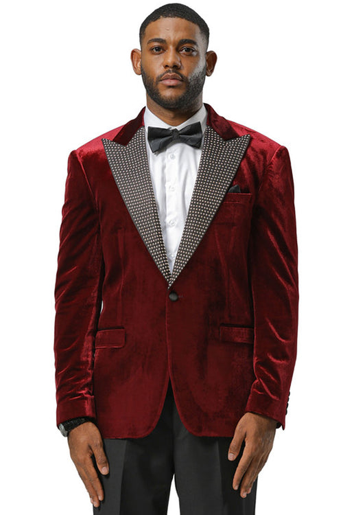 Burgundy velvet Stacy Adams tuxedo jacket with a shiny finish. Features rhinestone lapel, single-button closure, and structured shoulders for a formal look. Designed for weddings and proms.