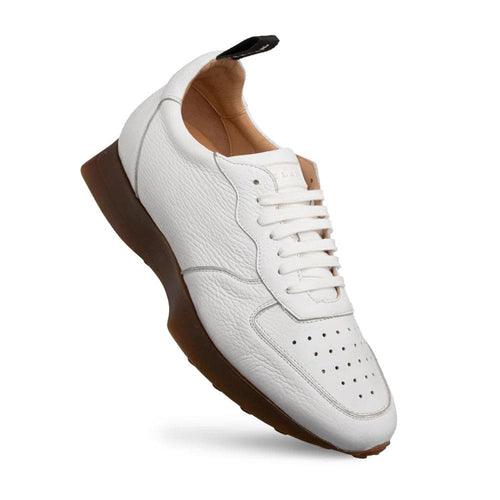 Mezlan's Gerardo sneakers: white deerskin with textured upper. Rounded toe, lace-up front, dark brown rubber sole, heel pull tab. Perforations enhance breathability.