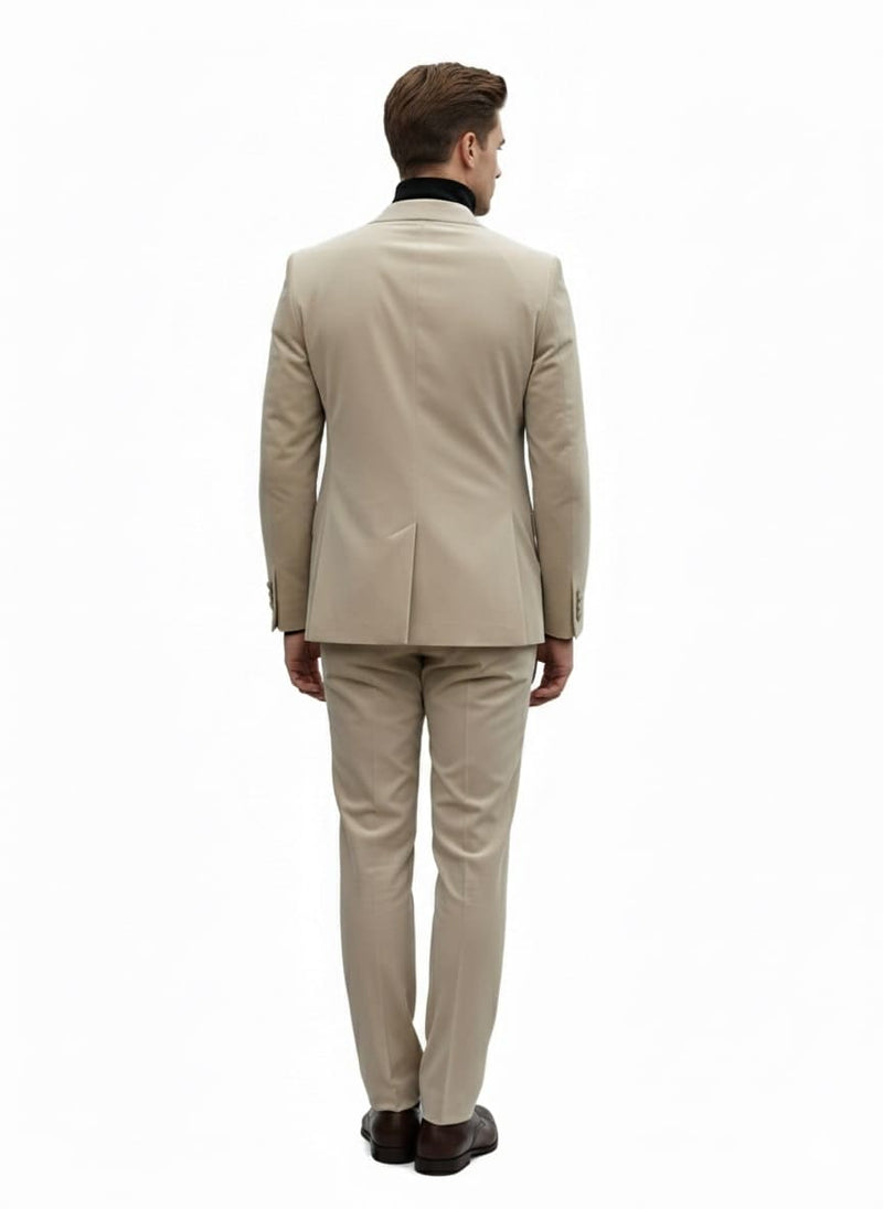 Men's sand beige velvet tuxedo suit. Slim-fit blazer with black collar and matching pants, crafted from winter fabric. Streamlined silhouette with back vent.