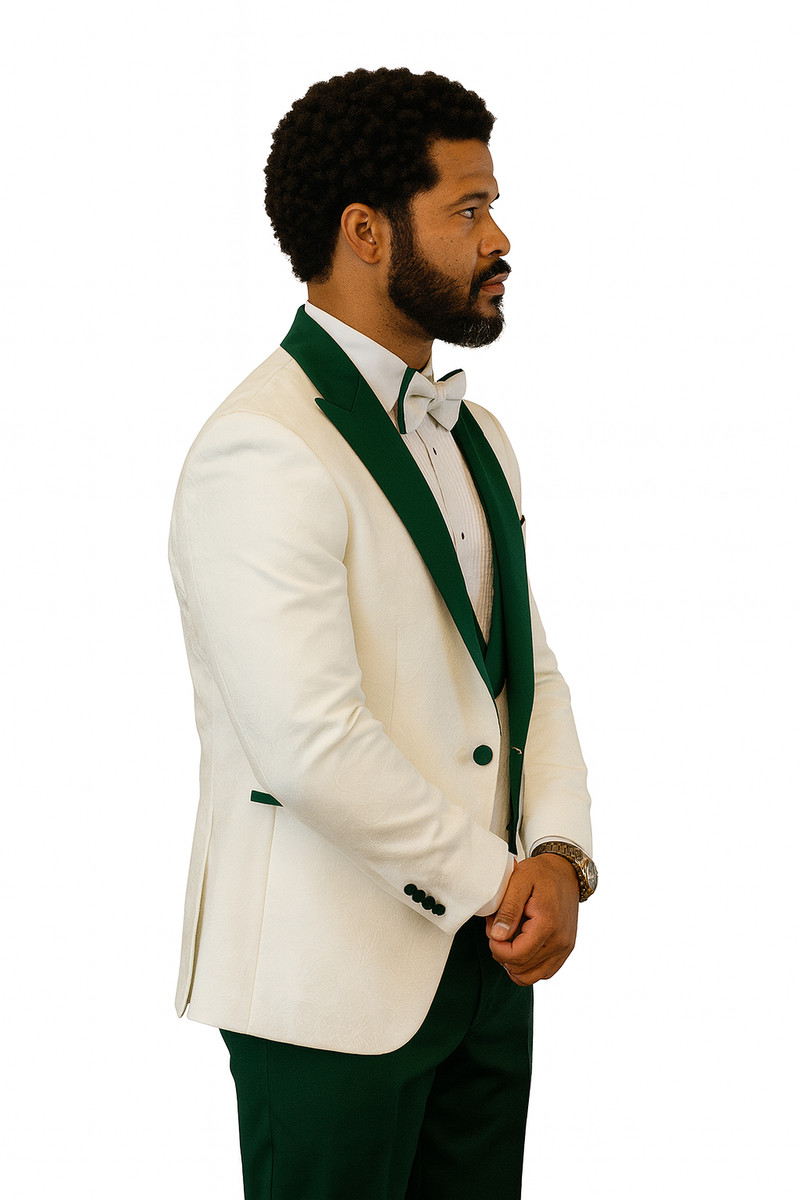 White paisley tuxedo jacket with hunter green shawl collar & matching buttons. Includes matching vest, hunter green wool pants, & white bow tie.