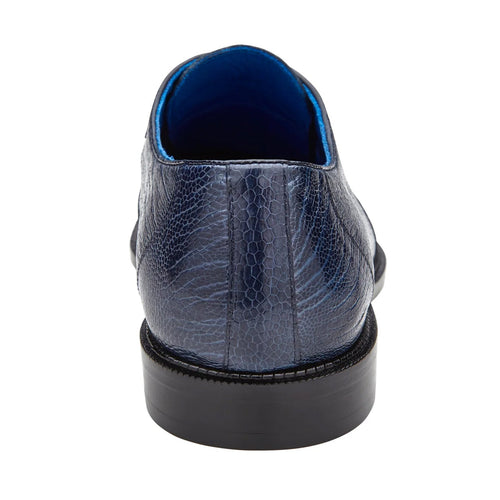 Navy Belvedere Siena ostrich leg moc toe dress shoe. Smooth, textured exterior, glossy finish. Rounded heel, blue lining, and black sole for a sleek profile.