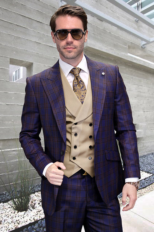 Men's wool suit with sapphire windowpane plaid. Features peak lapel, structured shoulders, and a fitted silhouette. Includes a beige vest for contrast. Deep blue and brown hues.