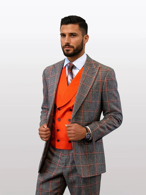 Men's coral over plaid 100% wool suit features a double-breasted vest. The suit displays a gray and orange plaid pattern, consisting of a tailored jacket and matching trousers.