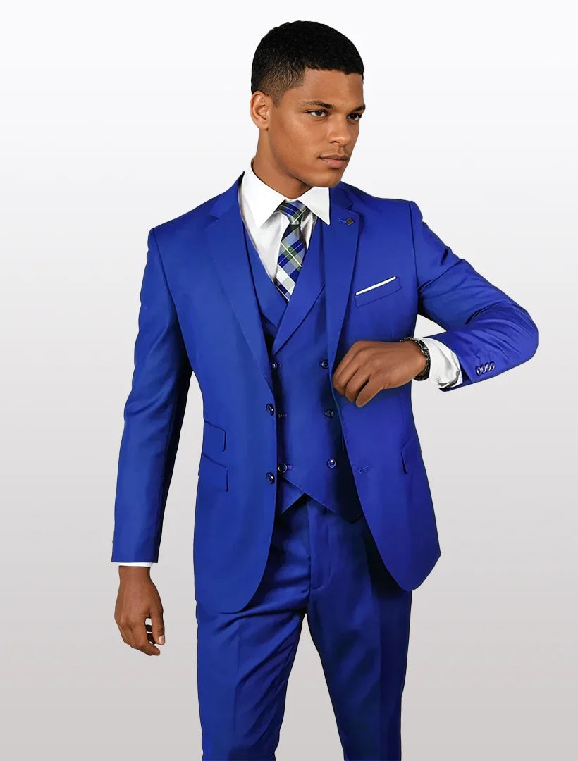 Mens royal blue modern fit vested suit by Alberto Nardoni features a tailored jacket with a sharp lapel, a matching vest underneath, and fitted trousers. The entire suit is made from 100% wool.