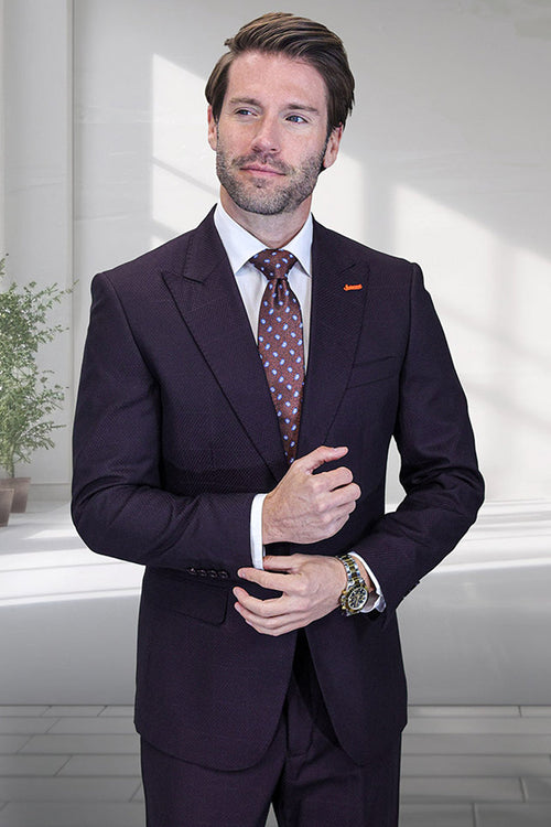 Men's eggplant purple wool suit with peak lapels & windowpane plaid. Fitted silhouette, structured shoulders, and long sleeves. Two-button closure. Designer quality.