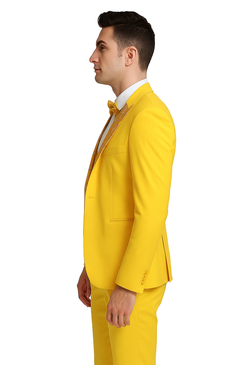 Golden yellow men's three-piece suit. Features a fitted cut, floral peak lapel, and matching bow tie. Jacket, trousers, and vibrant color.