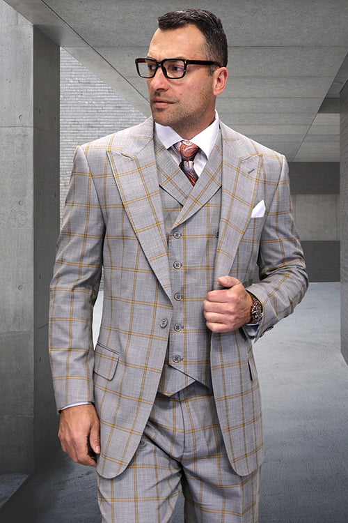 Men's wool suit with a tan gold windowpane plaid. Includes a one-button peak lapel blazer, fitted vest, and tailored trousers. Classic shape with structured shoulders and sharp lapels.