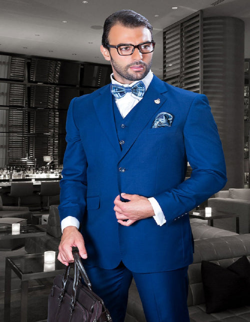 Men's classic fit sapphire blue wool blend suit. Two-button jacket with a fitted silhouette, and pleated pants. Perfect for formal occasions.